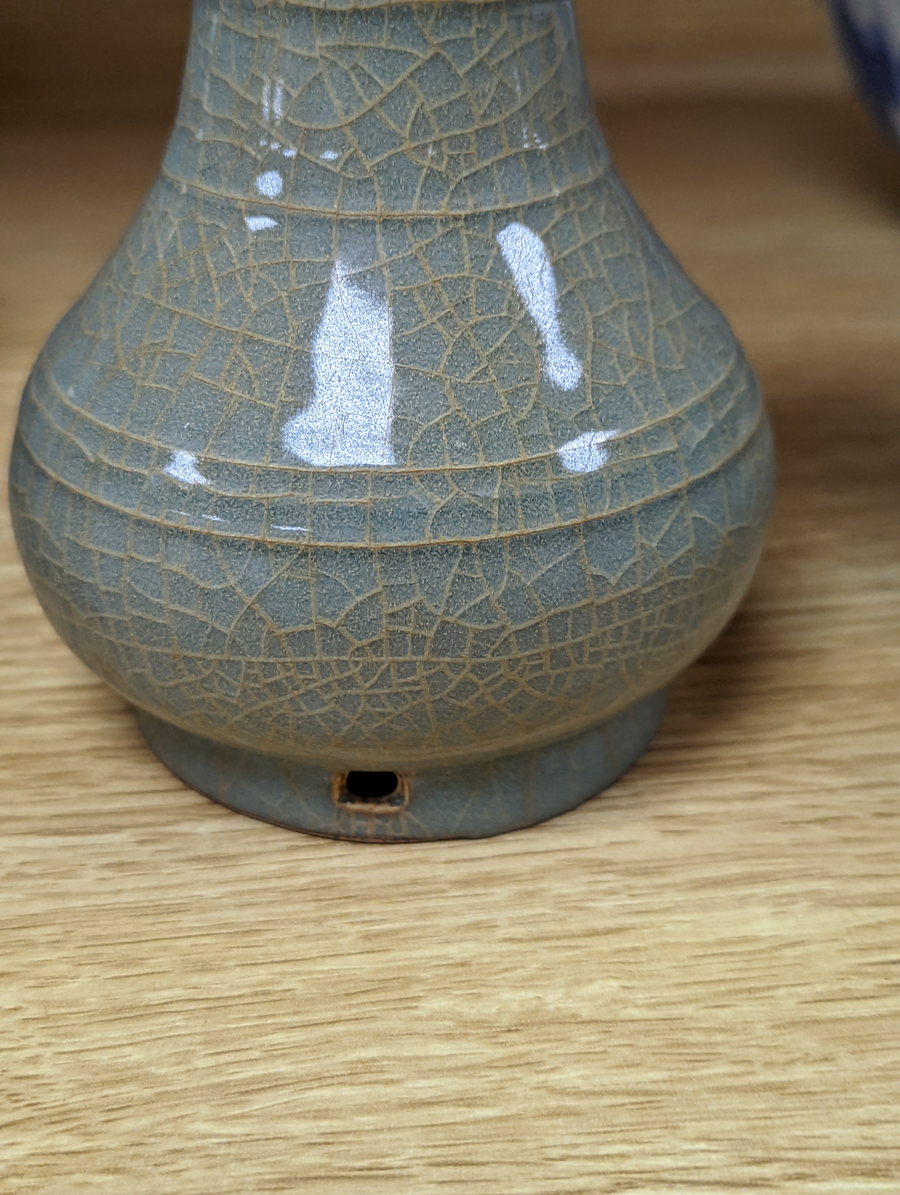 A Chinese celadon bottle vase 15.5cm